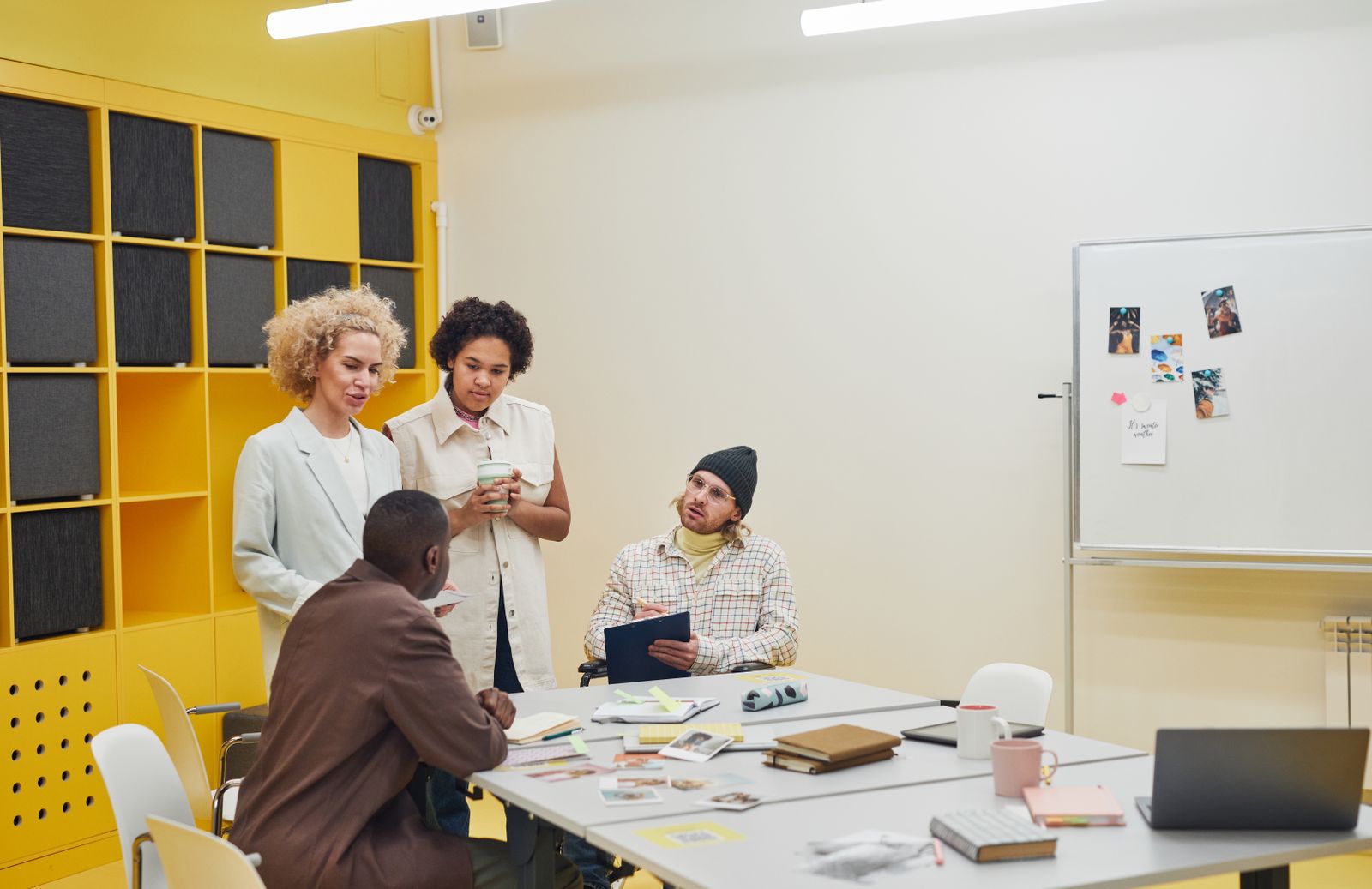 A small team working through a problem at one table