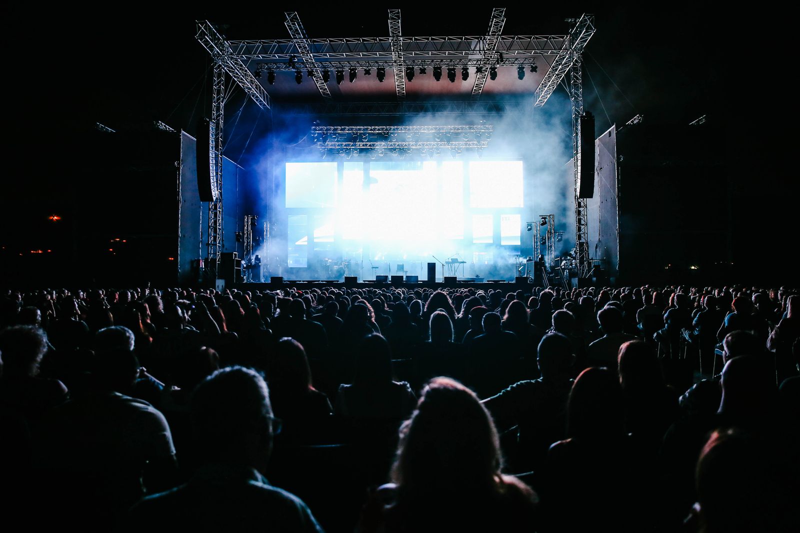 A crowd at a live event at night