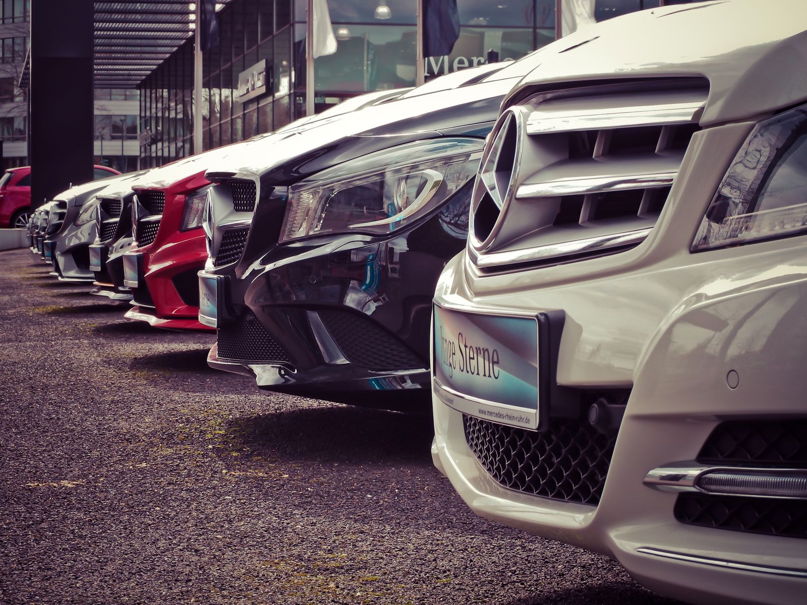 Cars on the floor of a dealership showroom